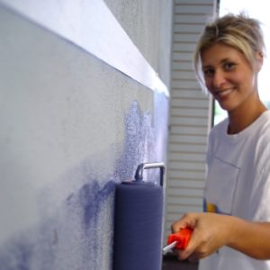 homeowner painting walls